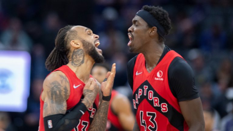 Toronto Raptors guard Gary Trent Jr. (33) and forward Pascal Siakam (43) celebrate after Siakam's 3-point basket against the Sacramento Kings during the second half of an NBA basketball game in Sacramento, Calif., Friday, Nov. 19, 2021. The Raptors won 108-89 (Luis Villegas/AP).