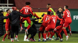 Team Canada celebrates a goal against Costa Rica during second half World Cup qualifier soccer action in Edmonton on Friday, November 12, 2021. (Jason Franson/CP)