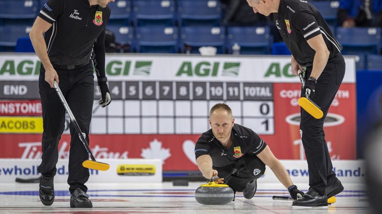 Team Jacobs skip Brad Jacobs throws. (Liam Richards/CP)