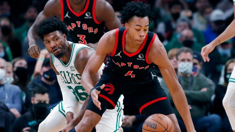 Toronto Raptors' Scottie Barnes (4) tries to control the ball in front of Boston Celtics' Marcus Smart (36) during the first half of an NBA basketball game Wednesday, Nov. 10, 2021, in Boston. (Michael Dwyer/AP)