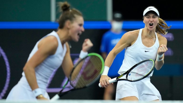 Russia's Liudmila Samsonova, right, celebrates with Veronika Kudermetova. (Petr David Josek/AP)