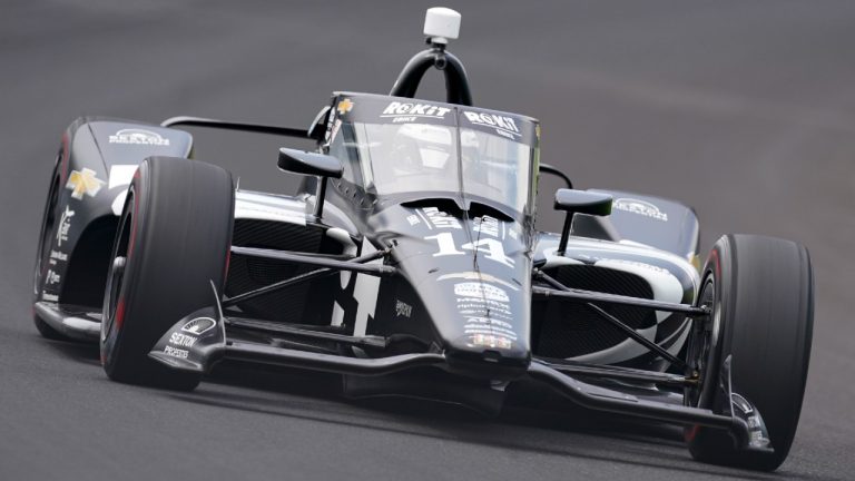 Sebastien Bourdais of France drives A.J. Foyt Racing's flagship No. 14 Chevrolet through the first turn during qualifications for the Indianapolis 500 auto race at Indianapolis Motor Speedway in Indianapolis, Saturday, May 22, 2021. Indy Lights champion Kyle Kirkwood, the most well-rounded driver of the next wave of young IndyCar newcomers, has at last found an open seat and will drive for A.J. Foyt Racing next season. Kirkwood will drive Foyt's No. 14 Chevrolet, the team said Wednesday, Nov. 10, 2021. (Michael Conroy/AP)