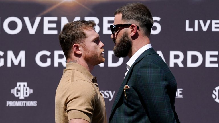 Unified WBC/WBO/WBA super middleweight champion Canelo Alvarez, left, faces off with undefeated IBF Super Middleweight Champion Caleb Plant during a news conference Tuesday, Sept. 21, 2021, in Beverly Hills, Calif. to announce their 168-pound title bout. The fight is scheduled for Saturday, Nov. 6 in Las Vegas. (Mark J. Terrill/AP Photo) 
