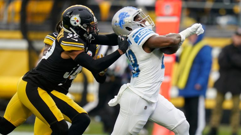 Detroit Lions running back Jermar Jefferson (28) heads for the end zone with Pittsburgh Steelers free safety Minkah Fitzpatrick (39) and Pittsburgh Steelers safety Terrell Edmunds (34) in pursuit during the first half of an NFL football game, Sunday, Nov. 14, 2021, in Pittsburgh. (Keith Srakocic/AP)