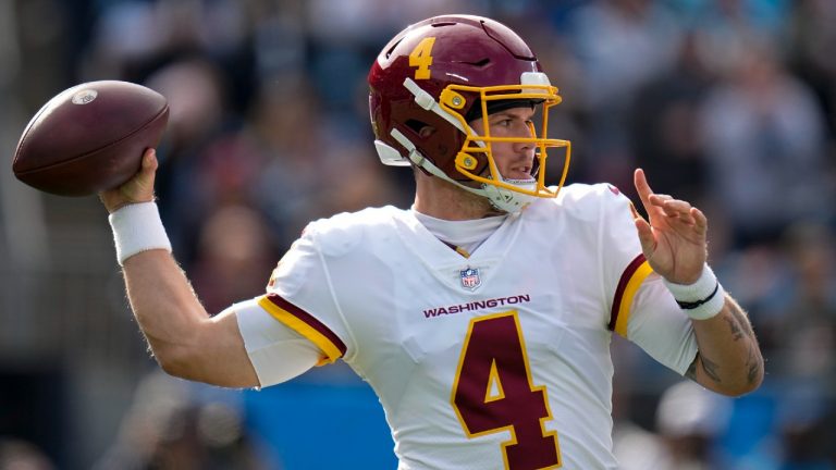 Washington Football Team quarterback Taylor Heinicke passes against the Carolina Panthers during the first half of an NFL football game Sunday, Nov. 21, 2021, in Charlotte, N.C. (Rusty Jones/AP)