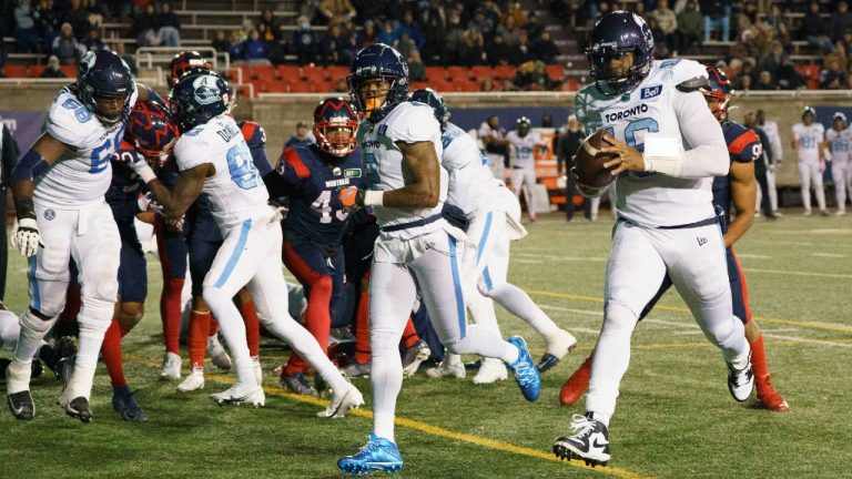 Toronto Argonauts quarterback Antonio Pipkin crosses the goal line to score a touchdown against the Montreal Alouettes during fourth quarter CFL football action in Montreal on Friday, October 22, 2021. (Paul Chiasson/CP)