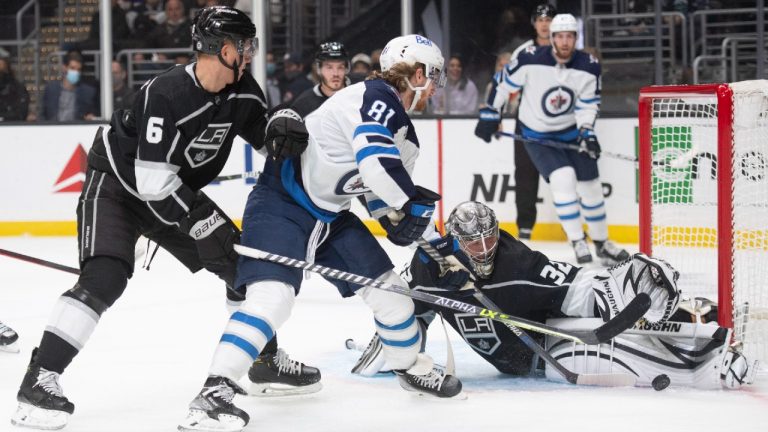 Los Angeles Kings goaltender Jonathan Quick (32) blocks a shot by Winnipeg Jets left wing Kyle Connor (81) during the first period of an NHL hockey game Thursday, Oct. 28, 2021, in Los Angeles. (Kyusung Gong/AP)