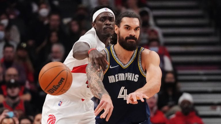 Memphis Grizzlies centre Steven Adams (4) passes the ball as Toronto Raptors forward Pascal Siakam (43) defends during first half NBA basketball action in Toronto on Tuesday, November 30, 2021. (Nathan Denette/THE CANADIAN PRESS)