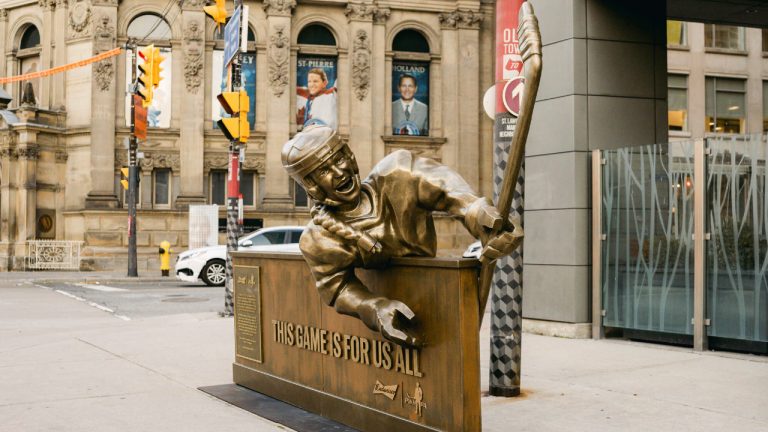 On Monday morning in downtown Toronto, a temporary statue of a female hockey player — “The Game is For Us All,” it’s officially called — was unveiled at 33 Yonge St., not far from the iconic one outside the Hockey Hall of Fame. (Photo courtesy: PWHPA)