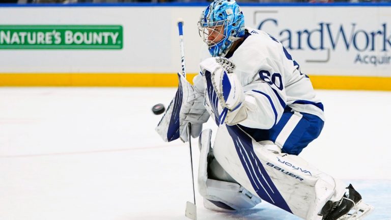 Toronto Maple Leafs goaltender Joseph Woll (60) stops a shot on goal during the second period of an NHL hockey game against the New York Islanders Sunday, Nov. 21, 2021, in Elmont, N.Y. (Frank Franklin II/AP)