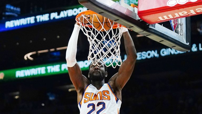 Phoenix Suns centre Deandre Ayton dunks against the Washington Wizards. (Ross D. Franklin/AP)