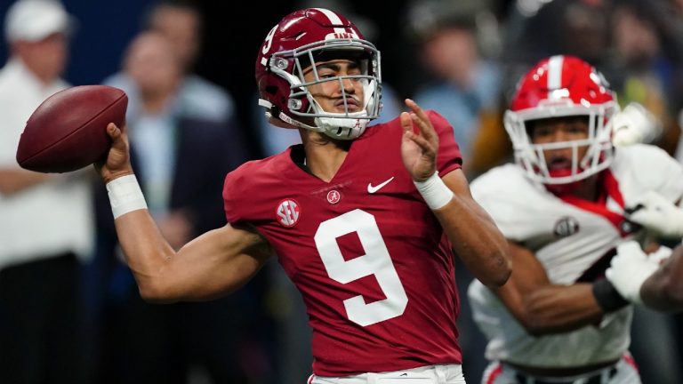 Alabama quarterback Bryce Young (9) passes in the pocket against Georgia during the first half of the Southeastern Conference championship NCAA college football game, Saturday, Dec. 4, 2021, in Atlanta (John Bazemore/AP).