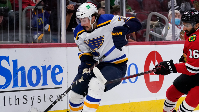 St. Louis Blues defenceman Justin Faulk, left, controls the puck against Chicago Blackhawks left wing Jujhar Khaira during action on Friday. (AP/file) 
