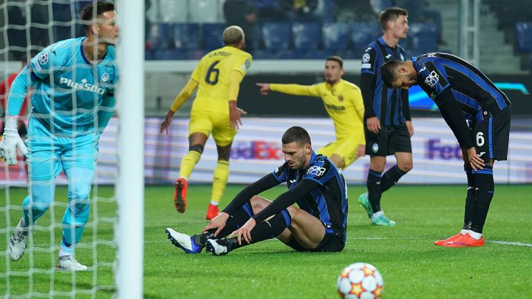 Atalanta's players look dejected after Villarreal scored during the Champions League group F soccer match between Atalanta and Villarreal in Bergamo, Italy, Thursday, Dec. 9, 2021. (Spada/LaPresse via AP)