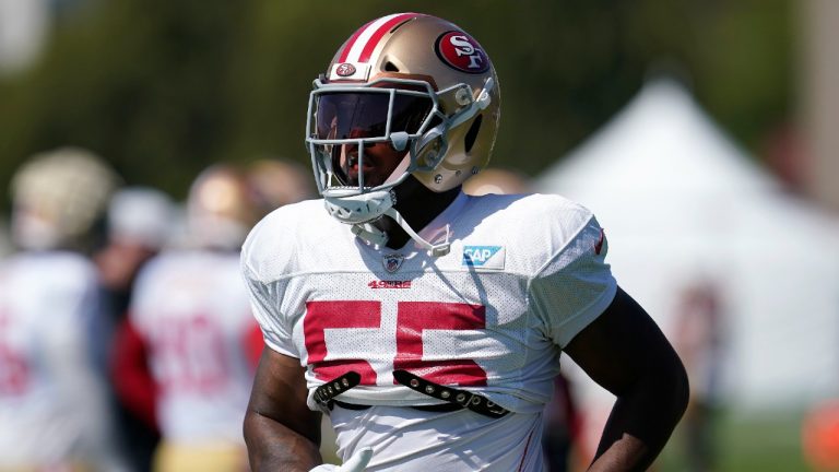 San Francisco 49ers defensive end Dee Ford jogs on the field at NFL football training camp in Santa Clara, Calif., Tuesday, Aug. 10, 2021 (Jeff Chiu/AP).