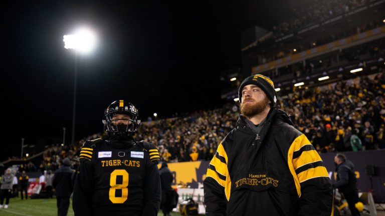 Hamilton Tiger-Cats quarterback Jeremiah Masoli (8) and quarterback Dane Evans (9) look on following the Tiger-Cats loss to the Winnipeg Blue Bombers in the 108th CFL Grey Cup in Hamilton, Ont., on Sunday, December 12, 2021 (Nick Iwanyshyn/CP).
