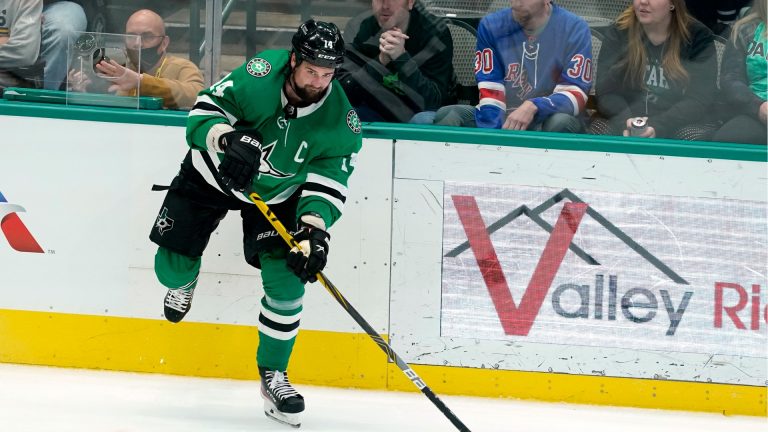 Dallas Stars left wing Jamie Benn makes a pass in the third period of an NHL hockey game against the Nashville Predators in Dallas, Wednesday, Nov. 10, 2021. (Tony Gutierrez/AP) 