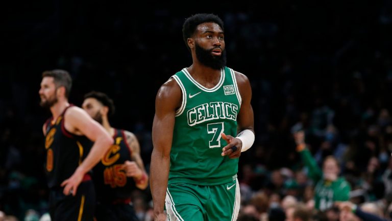 Boston Celtics' Jaylen Brown puts out three fingers after hitting a 3-point shot against the Cleveland Cavaliers during the second half of an NBA basketball game Wednesday, Dec. 22, 2021, in Boston. (Winslow Townson/AP)