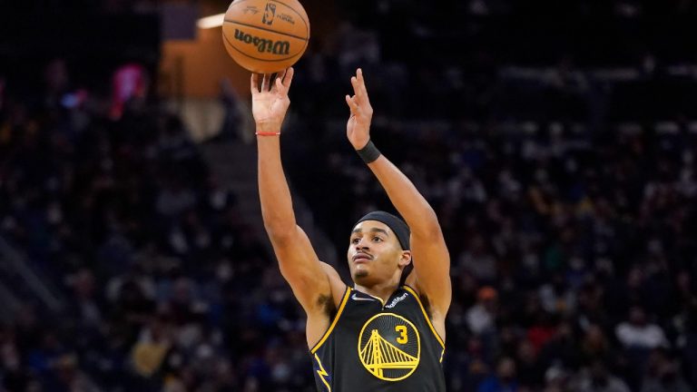 Golden State Warriors guard Jordan Poole shoots against the Portland Trail Blazers during the second half of an NBA basketball game in San Francisco, Wednesday, Dec. 8, 2021. (Jeff Chiu/AP) 
