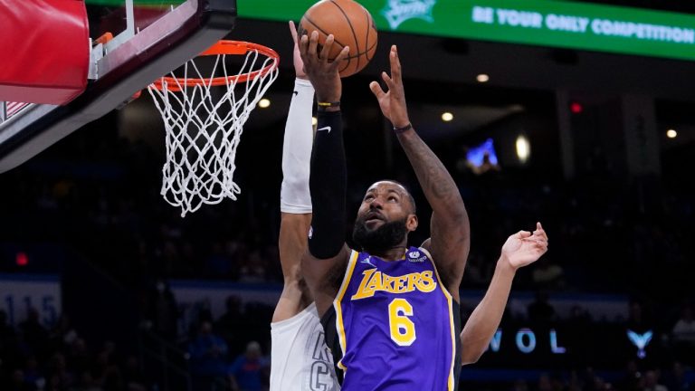 Los Angeles Lakers forward LeBron James (6) goes to the basket in front of Oklahoma City Thunder forward Darius Bazley during the first half of an NBA basketball game Friday, Dec. 10, 2021, in Oklahoma City. (Sue Ogrocki/AP) 