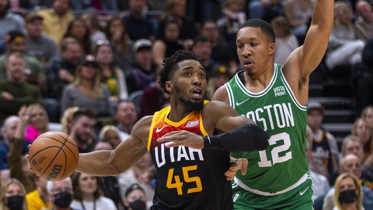 Utah Jazz guard Donovan Mitchell (45) drives against Boston Celtics forward Grant Williams (12). (Rick Egan/AP)