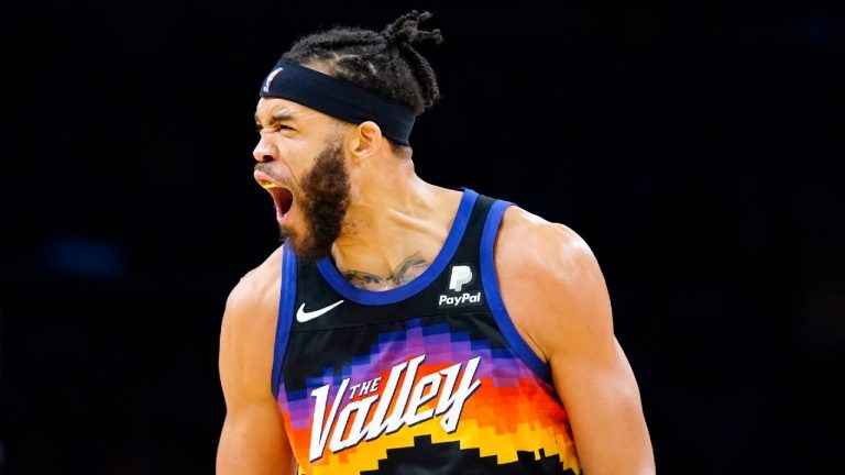 Phoenix Suns center JaVale McGee shouts after a Suns defensive stop against the Detroit Pistons during the first half of an NBA basketball game Thursday, Dec. 2, 2021, in Phoenix. (Ross D. Franklin/AP)