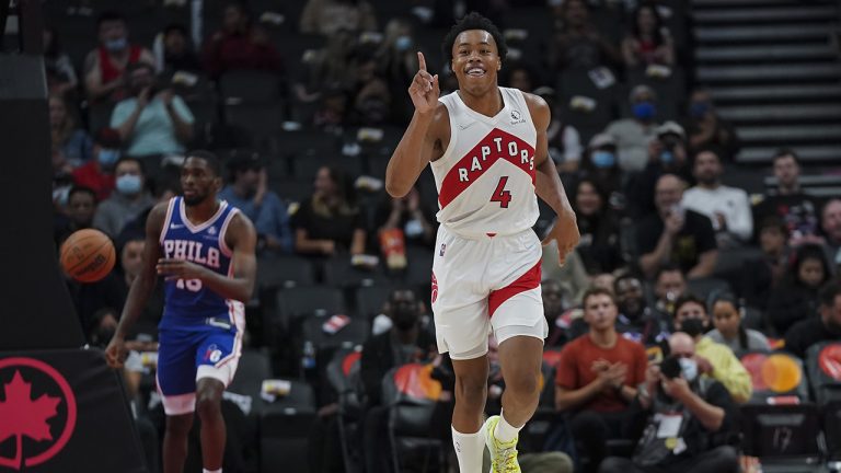 Toronto Raptors forward Scottie Barnes (4) reacts after a slam dunk past Philadelphia 76ers guard Shake Milton (18). (Nathan Denette/CP)