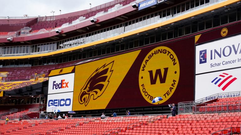Fedex Field screen displays the Washington Football Team logo during pregame warmups before the start of a NFL football game between Washington Football Team and Philadelphia Eagles, Sunday, Sept. 13, 2020, in Landover, Md. (Susan Walsh/AP Photo) 
