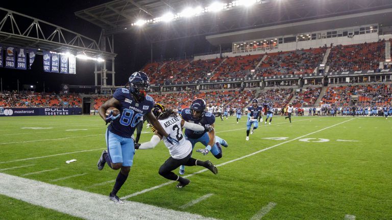 Toronto Argonauts wide receiver DaVaris Daniels (80) runs the ball out of bounds in the first half of their CFL football game against the Hamilton Tiger-Cats. (Cole Burston/CP)