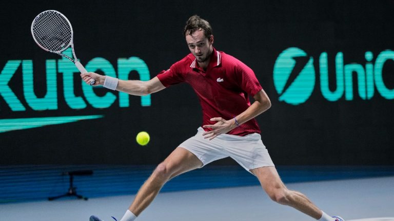 Russian Tennis Federation's Daniil Medvedev returns the ball to Sweden's Mikael Ymer during a Davis Cup quarter final match between Russian Tennis Federation and Sweden at the Madrid Arena stadium in Madrid, Spain, Thursday, Dec. 2, 2021. (Bernat Armangue/AP)