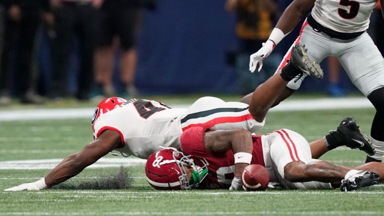 Alabama wide receiver John Metchie III (8) misses the catch against Georgia during the first half of the Southeastern Conference championship NCAA college football game, Saturday, Dec. 4, 2021, in Atlanta. (Brynn Anderson/AP Photo) 
