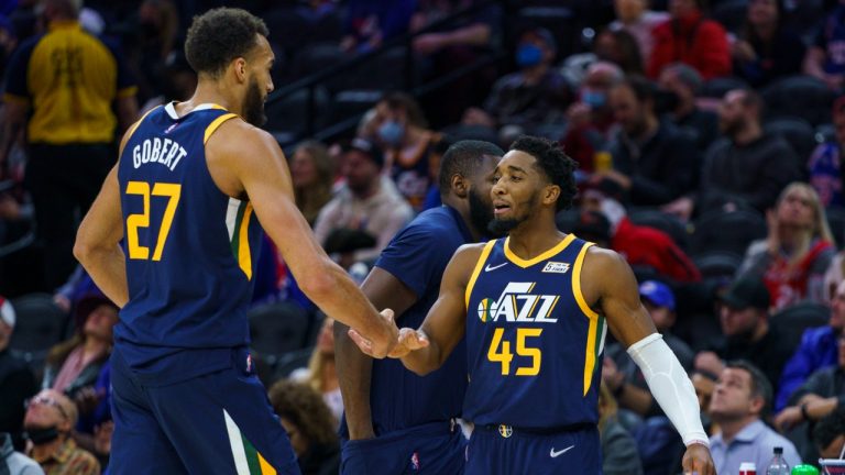 Utah Jazz's Donovan Mitchell, right, celebrates with Rudy Gobert during the second half of the team's NBA basketball game against the Philadelphia 76ers, Thursday, Dec. 9, 2021, in Philadelphia. (Chris Szagola/AP)