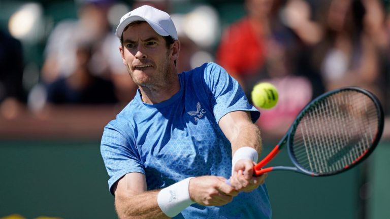 Andy Murray, of Britain, returns a shot to Carlos Alcaraz, of Spain, at the BNP Paribas Open tennis tournament Sunday, Oct. 10, 2021, in Indian Wells, Calif. (Mark J. Terrill/AP)