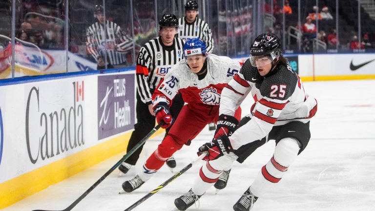 Canada's Owen Power (25) is chased by Czech Republic's Vojtech Jirus (25) during second period IIHF World Junior Hockey Championship action in Edmonton on Sunday, December 26, 2021. (Jason Franson/THE CANADIAN PRESS)
