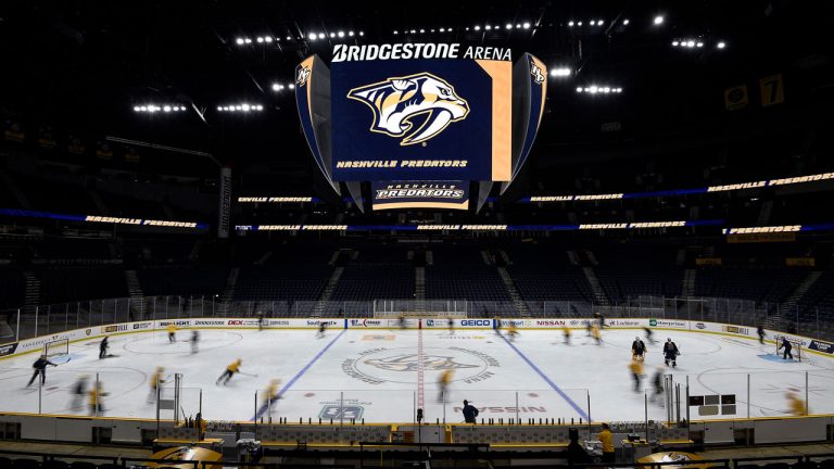 Nashville Predators players skate in the Bridgestone Arena. (George Walker IV/AP)