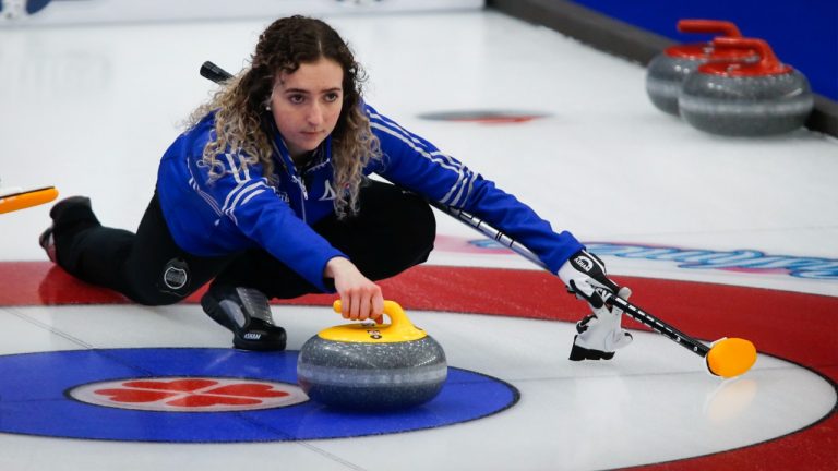 Team Wild Card 2 skip Mackenzie Zacharias makes a shot at the Scotties Tournament of Hearts in Calgary, Alta., Friday, Feb. 19, 2021. (Jeff McIntosh/CP)