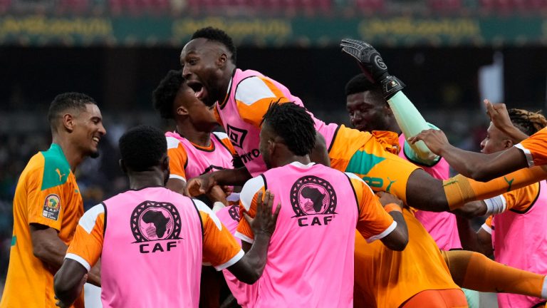 Ivory Coast's players celebrates after Nicolas Pepe scored a goal during the African Cup of Nations 2022 group E soccer match between Ivory Coast and Algeria at the Japoma Stadium in Douala, Cameroon, Thursday, Jan. 20, 2022. (Themba Hadebe/AP)