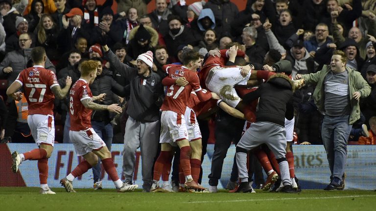 Nottingham Forest players celebrate after scoring the opening goal during the English FA Cup third round soccer match between Nottingham Forest and Arsenal. (Rui Vieira/AP)
