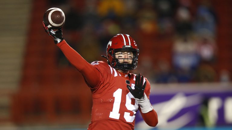 Former Calgary Stampeders quarterback Bo Levi Mitchell throws a pass against the Winnipeg Blue Bombers. (Todd Korol/CP)