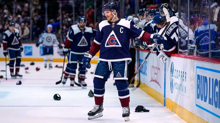 Colorado Avalanche left wing Gabriel Landeskog (92) celebrates a hat trick against the Winnipeg Jets during the third period of an NHL hockey game Thursday, Jan. 6, 2022. (Jack Dempsey/AP)