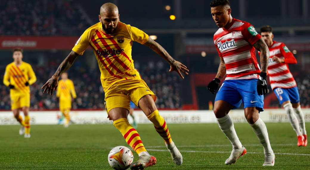 Alves assists in Liga return in Barcelona tie with Granada