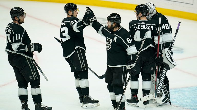 Los Angeles Kings celebrate a 3-1 win over the New York Rangers after their NHL hockey game Monday, Jan. 10, 2022, in Los Angeles. (Ashley Landis/AP)