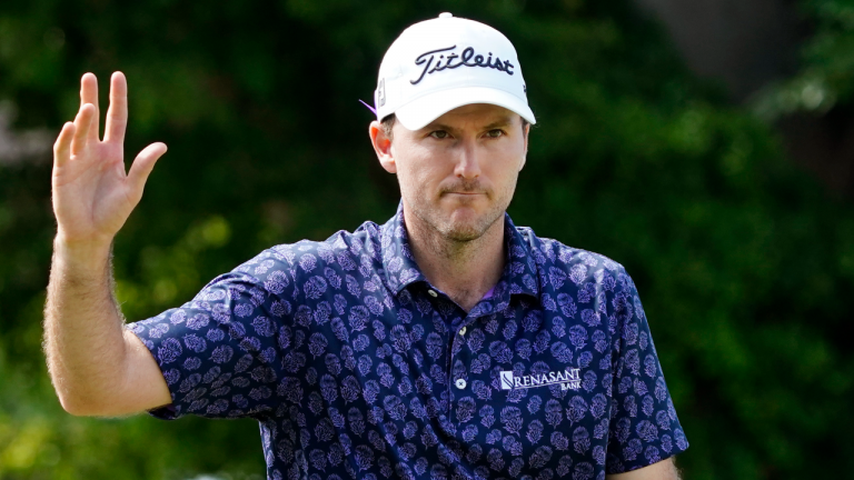 Russell Henley waves after making an eagle on the ninth hole during the second round of the Sony Open, Friday, Jan. 14, 2022, at Waialae Country Club in Honolulu. (AP) 