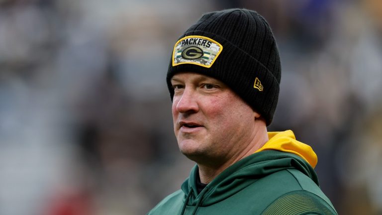 Green Bay Packers offensive coordinator Nathaniel Hackett looks on during pre-game warm-ups before an NFL football game against the Cleveland Browns Saturday, Dec. 25, 2021, in Green Bay, Wis. A person with knowledge of the negotiations told The Associated Press early Thursday morning, Jan. 27, 2022, that the Denver Broncos are finalizing a deal to hire Packers offensive coordinator as their new head coach. The person spoke on condition of anonymity because the deal was still in the works and the team hadn't announced the hiring. (Jeffrey Phelps/AP PHOTO) 