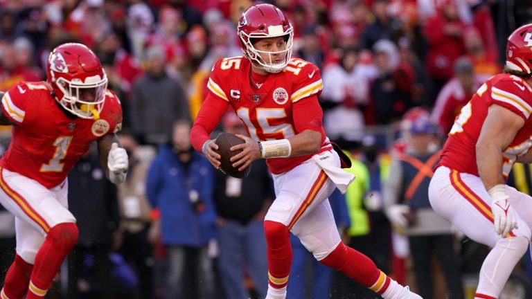Kansas City Chiefs quarterback Patrick Mahomes (15) scrambles out of the pocket before throwing a pass during the first half of the AFC championship NFL football game against the Cincinnati Bengals, Sunday, Jan. 30, 2022, in Kansas City, Mo. (Eric Gay/AP)