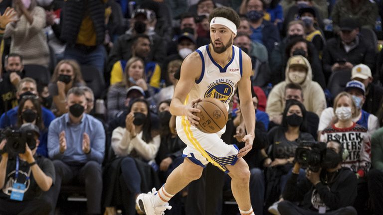 Golden State Warriors guard Klay Thompson (11) takes the ball down court against the Cleveland Cavaliers during the second half of an NBA basketball game in San Francisco. (John Hefti/AP)