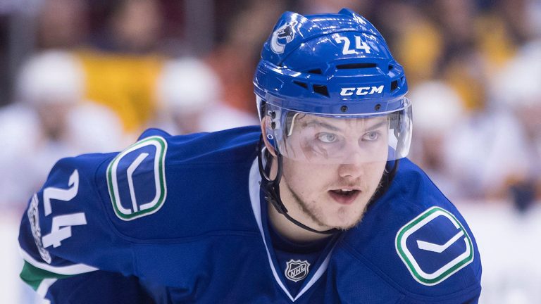 Former Vancouver Canucks forward Reid Boucher lines up during a faceoff during the first period of an NHL hockey game against the Nashville Predators. (Darryl Dyck/CP)