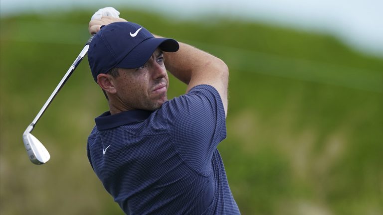 FILE - Rory McIlroy, of Northern Ireland, watches his shot on the second tee on day three of the Hero World Challenge PGA Tour. (Fernando Llano, File/AP)