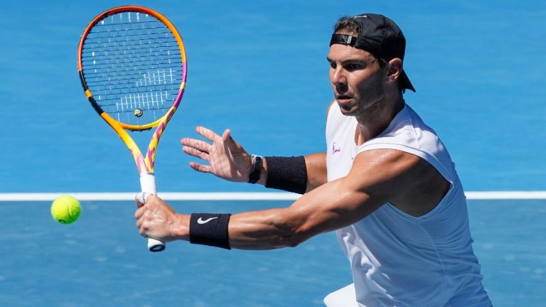 Spain's Rafael Nadal hits a backhand during a practice session on Rod Laver Arena ahead of the Australian Open at Melbourne Pack, Australia, Wednesday, Jan. 12, 2022. (Mark Baker/AP)