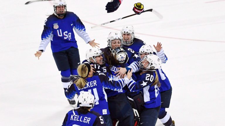 The United States celebrate their gold medal victory over Canada in women's Olympic hockey action at the 2018 Olympic Winter Games in Gangneung, South Korea on Thursday, February 22, 2018 (Nathan Denette/CP).